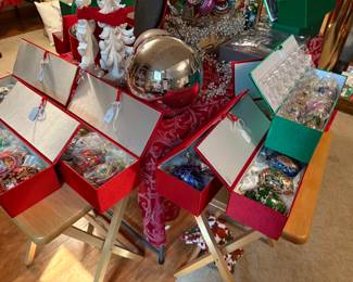 These are boxes of unopened Joan Rivers holiday egg ornaments...expensive when purchased! They would make a lovely tree. Check out our price!