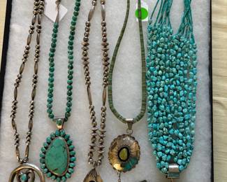 Wonderful sterling bear necklace and other good pieces.  The color on this picture is off...come see them in person! :)