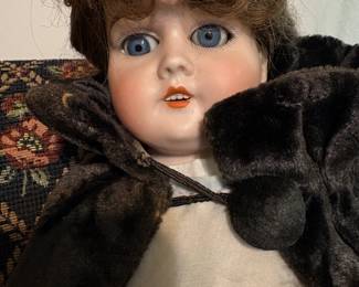 Nice old German bisque doll on a kid leather body.