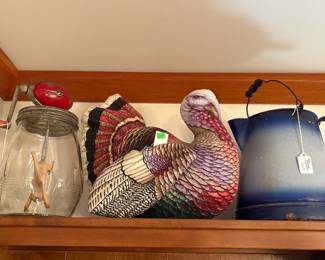 Get ready for Thanksgiving. It's just around the corner. He is joined by a nice Dazey churn and a good old granite coffee pot.