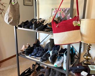 An array of women's shoes, an MK purse and a SAK purse...both nice.