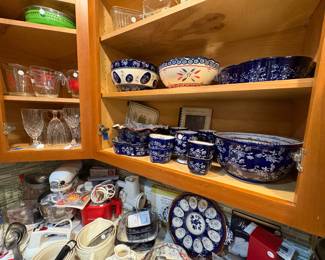 A view of the kitchen upper cabinets.