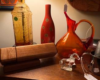 Fun art glass pitcher, wooden kaleidoscope and polka -dot bottle.