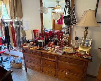This is a nice dresser with large mirror. It is covered with yes...you guessed it!...more jewelry.
