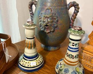 Unusual old vase with face.