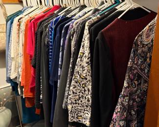 Rack of nice women's clothing.