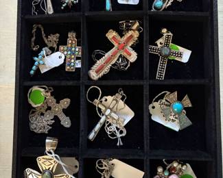 An array of sterling crosses.