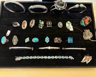 A selection of sterling rings and bracelets.