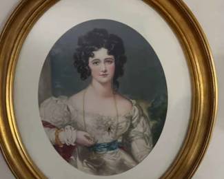 Woman In Oval Gold-Toned Frame
