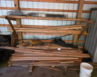 Fence poles and cheery wood boards.