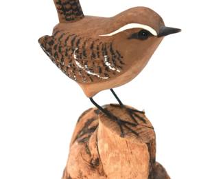 bird on driftwood figurine