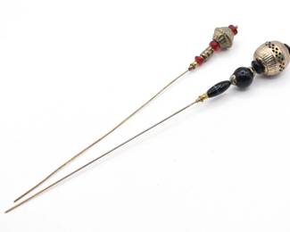 pair of vintage stick pins