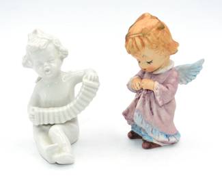 misc angel lot: one playing musical instrument and one is a Eve Rockwell