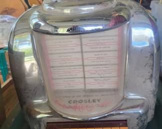 Cool Replica Table Jukebox.  It's a radio.