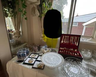 Lamp on table was removed by family member; Kentucky derby glasses; and White House garden club ornamnets