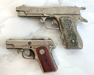 Lot 7626 Vintage Metal Hubley Forty Five and Champ Toy Guns