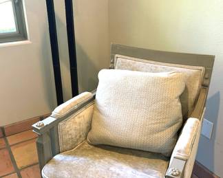 Shabby chic decor – dresser, framed mirror, wall sconces, armchairs