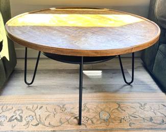 Round wood coffee table