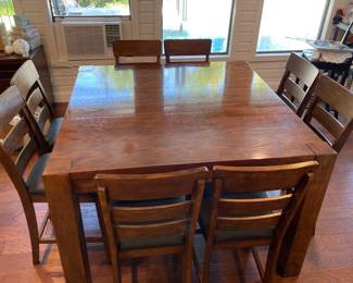 Bar Height table with eight chairs