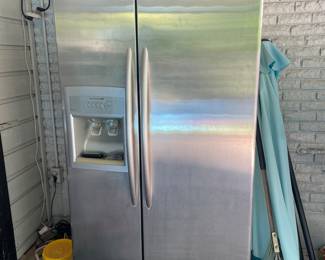 Great Garage Refrigerator. Works well but ice maker needs attention 