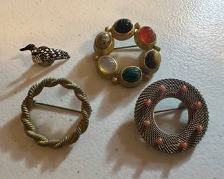 4 Brooches $8.00