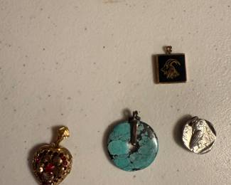 4 Pendants $12.00