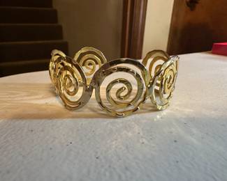 Gold Tone Swirl Bracelet $4.00