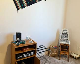A Track player and A tracks, luggage stand, yarn, and more