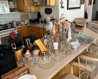 Don't loose your head this kitchen is packed with all the essentials and beautiful antique crystal, corning ware and more