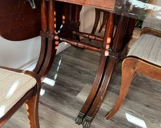 more photos of dining room table (legs that expand out)