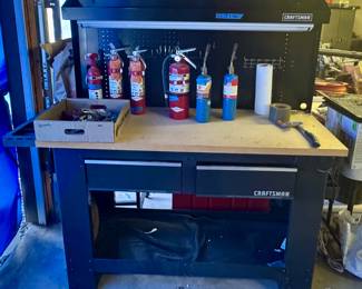 Craftsman workbench and fire extinguishers