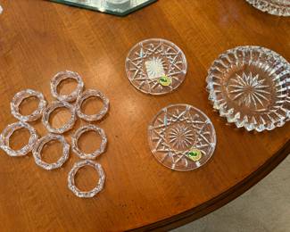 Glass napkin rings, and Waterford crystal coasters and dishes