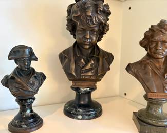 Bronze busts on marble stands