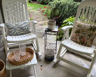2 white rocker armchairs and ottoman, tile drink table, planters and accessories