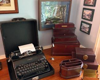 Antique Corona typewriter, wood storage boxes. brass desk accessoroies and great Michigan photos
