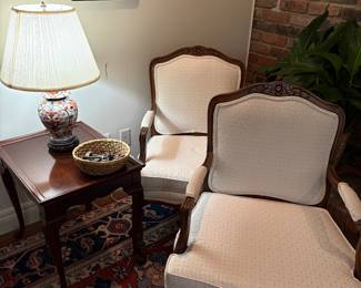 Armchairs and side table shown with porcelain lamp and wool area rug (11x14)