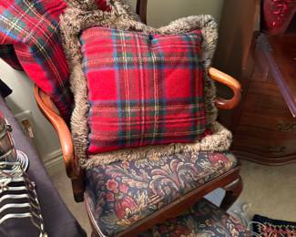 Armchair and matching ottoman, and holiday pillow and cozy blanket