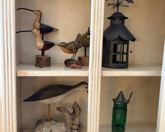 Wood birds with driftwood, metal windvane, and vintage glass
