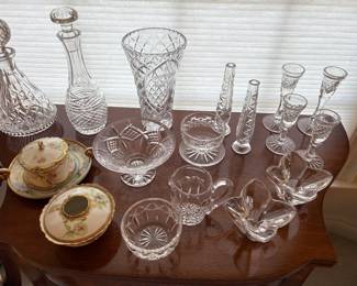 Crystal decanters, candle holders, cream and sugar, and more