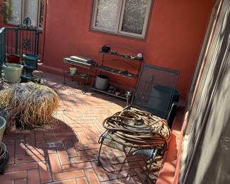 Outdoor stuff, pots, chaise lounge chair