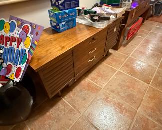 A wooden locking chest, I can't say the name, I get in trouble, but you can see when you shop.