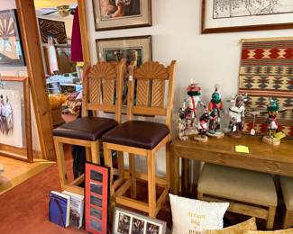 Tall bar stools, books, picture frames