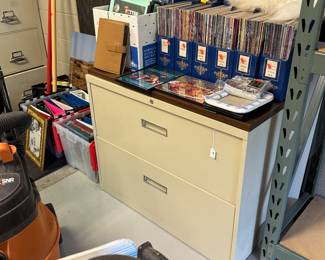 file cabinets, books, shop vac