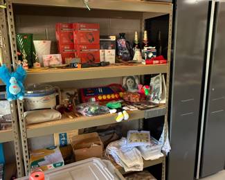Lots of misc stuff, games, crock pot, old toys, old books, vases