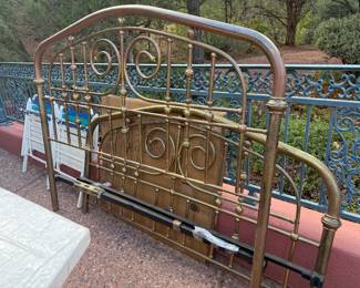Queen Brass head and footboard with iron supports