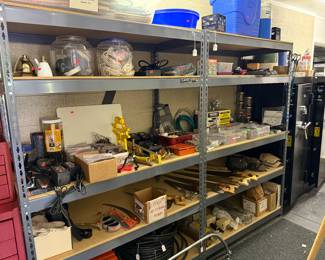 Misc household items, saws, zip ties, plant tying thingys, tool chargers, wire, twine, shower head, extension cords