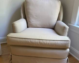 Upholstered swivel and rocking chair