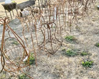 Lots of Swinging Basket Planters,  and Planter stands
