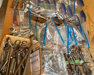 Wrenches and socket sets galore.