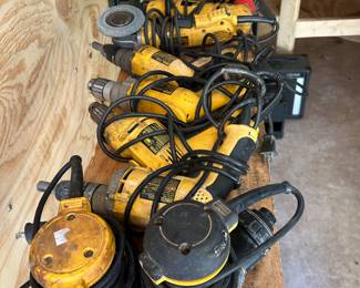 Large quantity of DeWalt power tools.